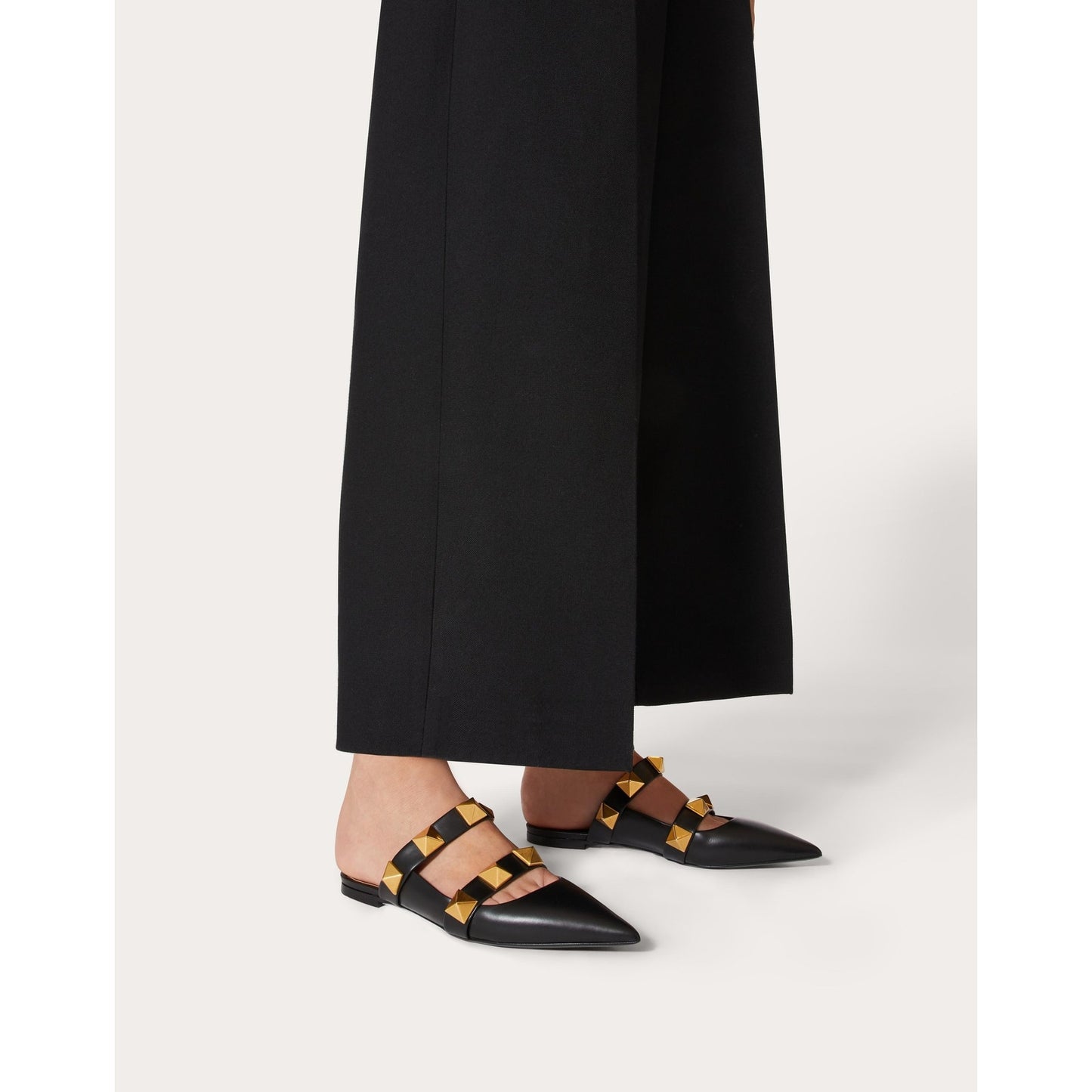 Valentino Garavani Black Roman Stud Flat Leather Mules Gold