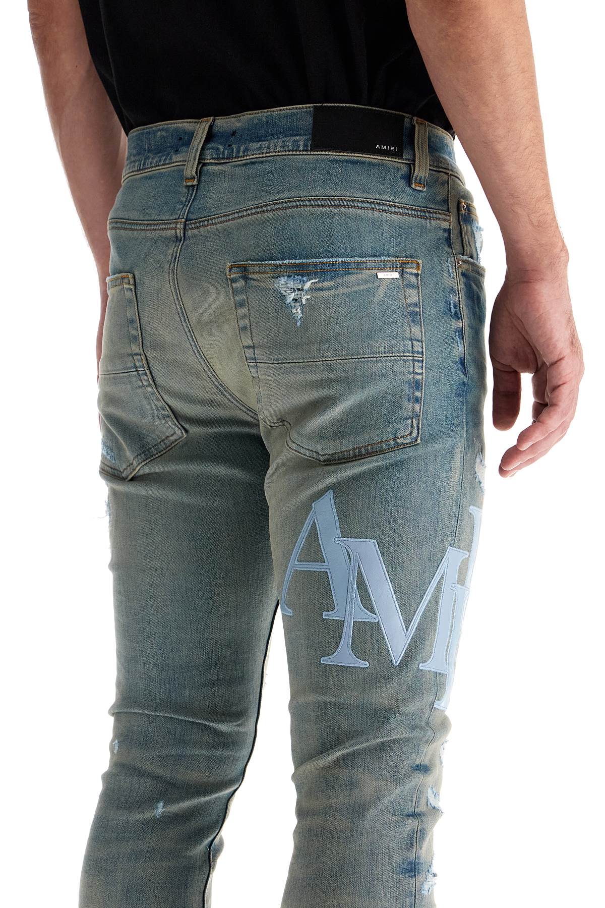 AMIRI Jeans Con Logo In Pelle