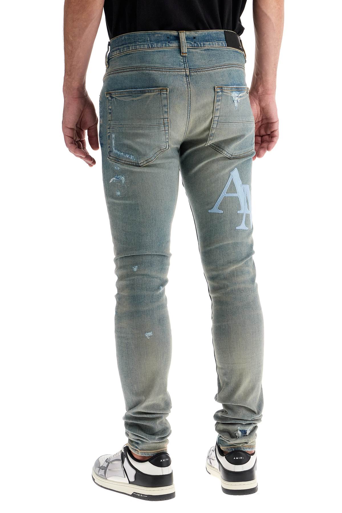 AMIRI Jeans Con Logo In Pelle